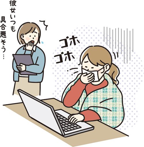 咳き込む女性と心配する職場の同僚