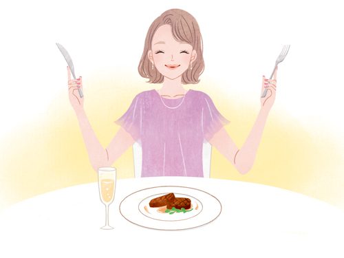 食事している女性